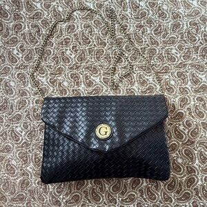 Elegant Black Woven Clutch with Gold Detail